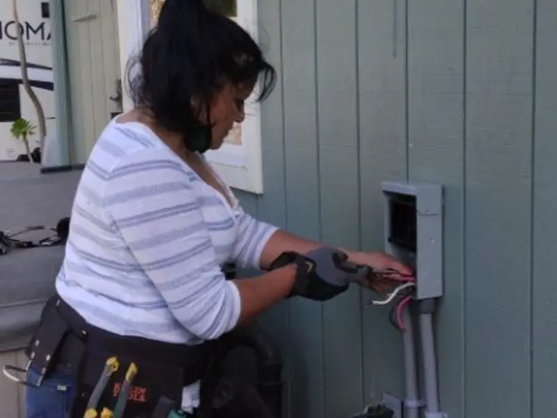 Licensed electrician wiring an exterior subpanel in East Lampeter